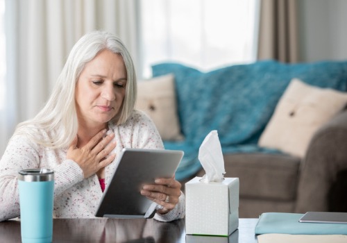 A woman engaging in Telehealth in Peoria IL via a virtual appointment with her therapist
